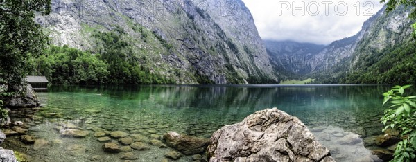 Scenic view of Obersee lake in Bavaria a misty day. Panorama