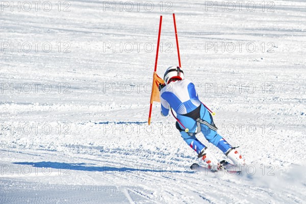 Skier on a slope in the italian alps