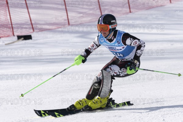 Mount skier Zhuravchenko Stepan Krasnodar Region skiing down. Russian Alpine Skiing Championship, International Ski Federation Championship, slalom. Moroznaya Mount, Kamchatka, Russia, March 29, 2019
