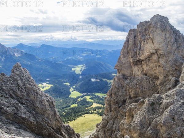 Climbing on the Rotwand and Masare via ferrata in the rose garden in the Dolomites, South Tyrol, Italy