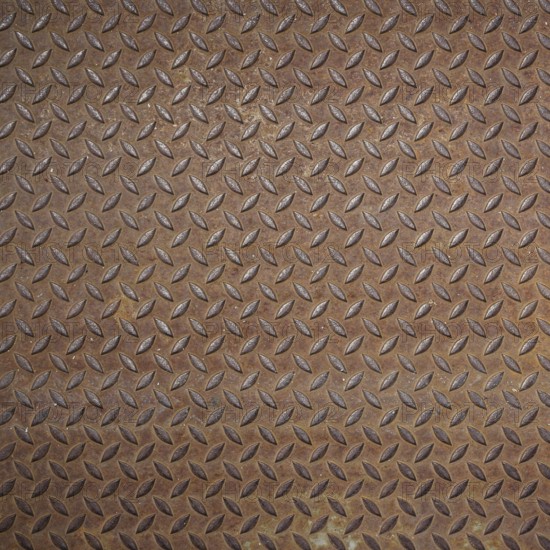 Front view of a rusty panel with non-slip surface