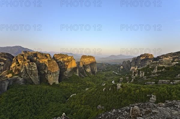 Monastery of Varlaam, Holy Monastery of Saint Nicholas, Monastery of Rousanou and Megalo Meteoro photographed at sunrise