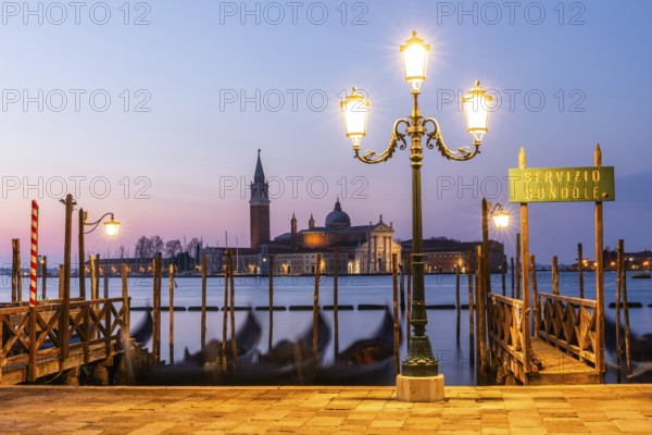 Dawn, Venetian gondolas with the church of San Giorgio Maggiore in the background, Venice, UNESCO World Heritage Site, Veneto, Italy
