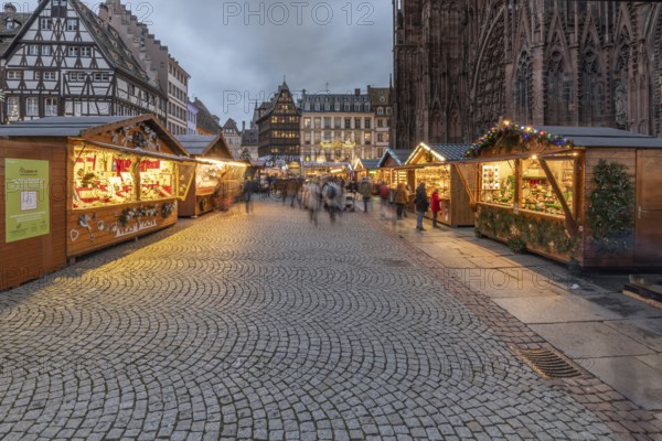 Famous Christmas market on the cathedral square in Strasbourg in Alsace. Health precautions and mandatory barrier gestures, protections against the covid pandemic in 2021