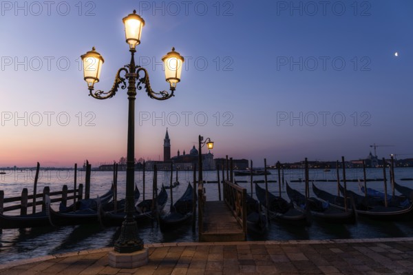 Dawn, Venetian gondolas with the church of San Giorgio Maggiore in the background, Venice, UNESCO World Heritage Site, Veneto, Italy