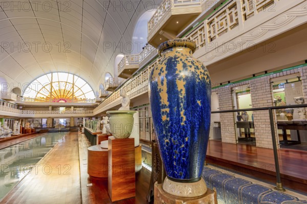 ROUBAIX, FRANCE, JUNE 14, 2024 : interiors Art Deco decors and sculptures of the olympic swimming pool La Piscine, built year 1927 by the Lille architect, Albert Baert