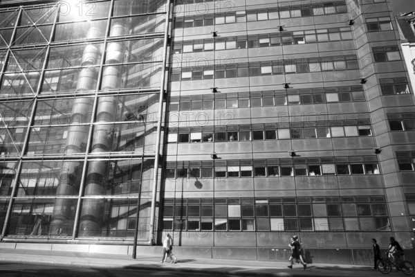 Man and building in paris, france