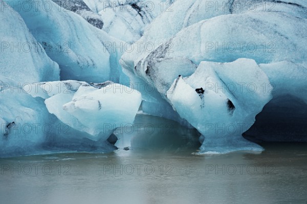 Detailed close-up of blue icebergs showcasing cracks and textures, iceberg, glacier, snow, ice rock, ice diamont, glacier lagoon, nature, snow, Iceland