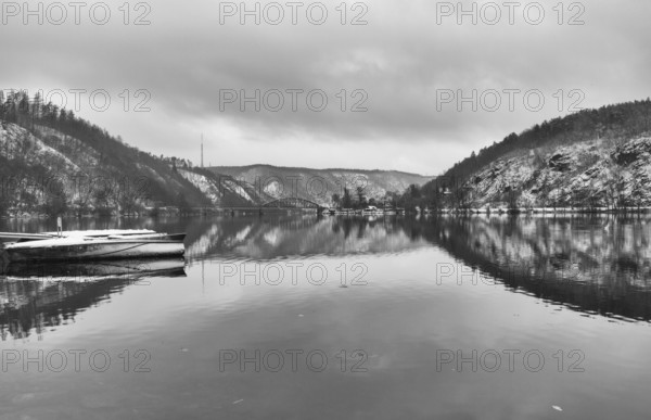 Single track railway bridge over the Vltava river, Czech Republic . Winter landscape