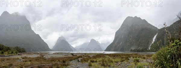 Magnificent panoramic view of Milford Sound during rainy weather, South Island of New Zealand