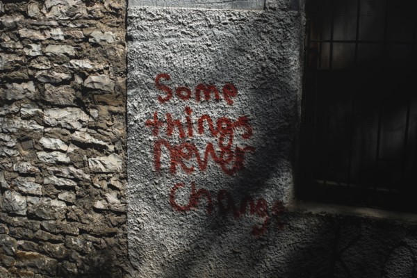 Writing on the wall of the building in Gjirokaster, Albania