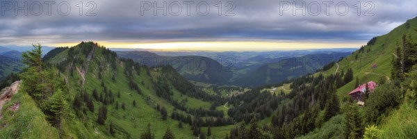 Panoramic view from the Nagelfluhkette to the foothills of the Alps, Nagelfluhkette, Allgäu. The Alpine Club hut on the right