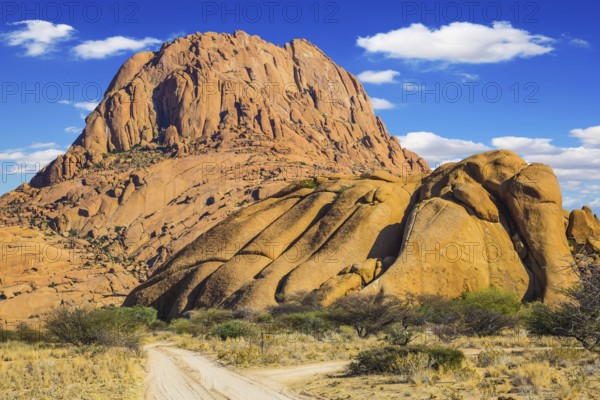The Stone Desert. Picturesque cliffs in the desert Namib. Travel to Africa. The concept of active, extreme and photo-tourism