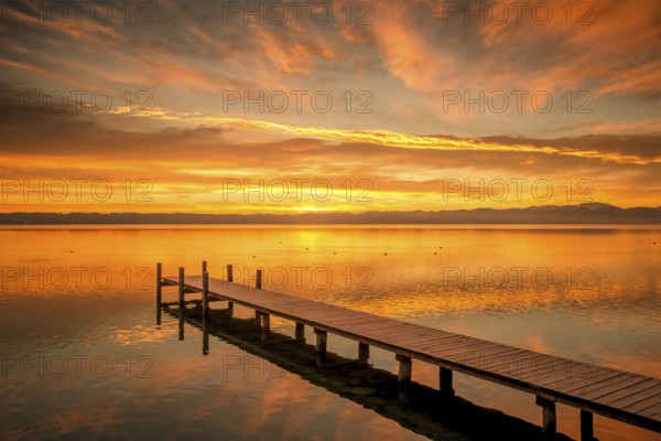 An image of a sunrise at the Starnberg Lake in Germany