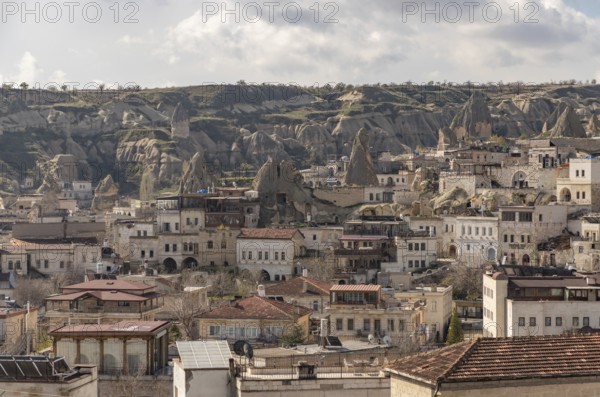 A picture of the town of Goreme and the landscape of the Goreme Historical National Park, in Cappadocia