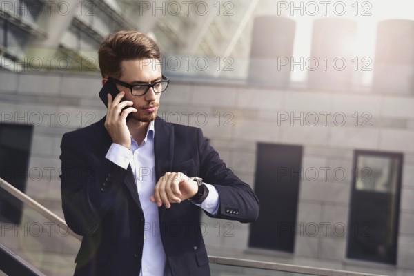 Successful caucasian businessman in elegant suit stand at street in the city