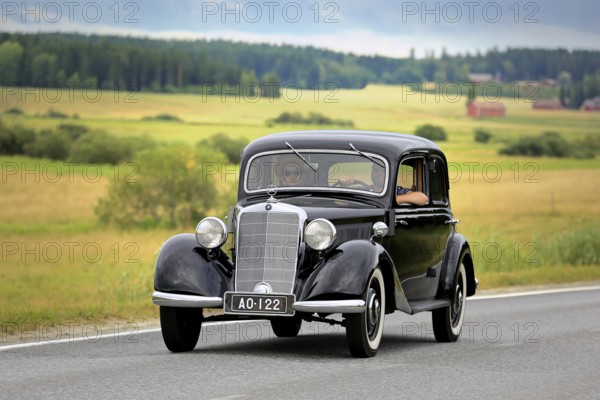 VAULAMMI, FINLAND, AUGUST 4, 2018: Classic black Mercedes-Benz car, probably mid-1930s 170V, on Maisemaruise 2018 car cruise in Tawastia Proper, Finland