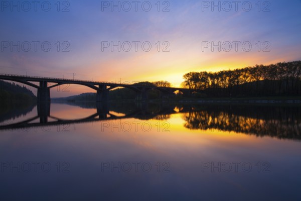 Branik bridge at sunrise. This bridge widely known as Bridge of intelligence is a rail and pedestrian bridge spanning the Vltava river in Prague