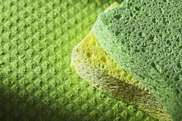 Cleaning kitchen sponges on dishcloth