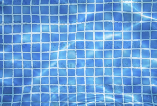 Vacation Abstract Background Of Water Ripples Over Swimming Pool Tiles