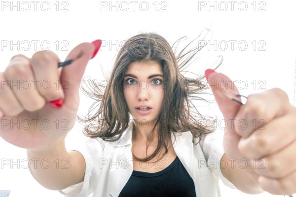 Girl having Electric Shock, electricity problems, Girl holds bare wires