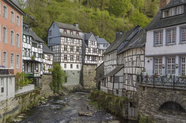 Picturesque houses along the Rur River in the historic center of Monschau, Germany
