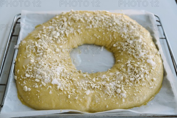 Close Up Of making of sweet bread ringed dessert On oven plate. Called roscon is typical in spanish cuisine. Horizontal composition