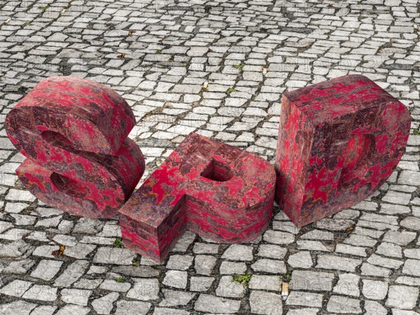 SPD crisis. Rusted party logo on pavement