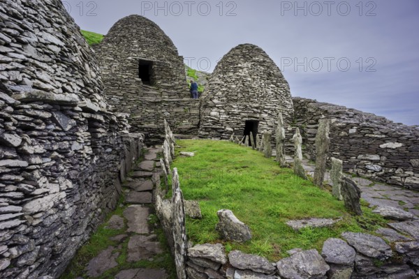 Clochans, stone cells. monastery at the top, Skellig Michael island, Mainistir Fhionáin (St. Fionan?s Monastery), county Kerry, Ireland, United Kingdom