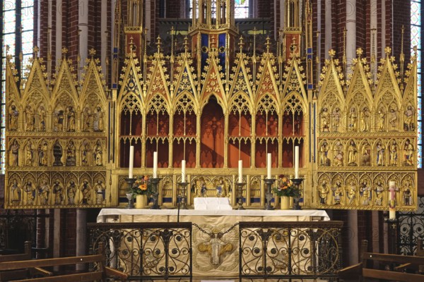Fantastically decorated Gothic winged altar in Doberan Minster. Bad Doberan, Mecklenburg-Western Pomerania, Germany