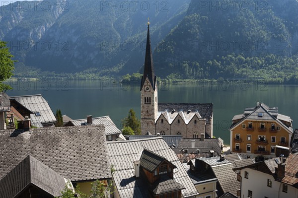18 Jun 2019, Hallstatt, Salzkammergut, Upper Austria, Austria, Europe, View of Hallstatt with Lake Hallstatt and mountains in the background. The small town is a favourite travel destination for the Chinese and exists as a replica in the province of Guangdong in China