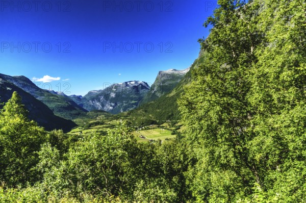 Impressive nature on the pass road to Geiranger in Norway in the summertime. On the road through the mountains to Geiranger in Norway in the summertime