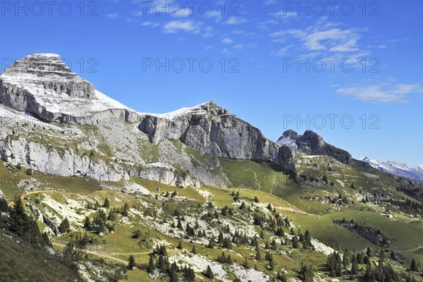 Swiss Alps in early fall. Cold sharp rocks slightly sprinkled with the first snow