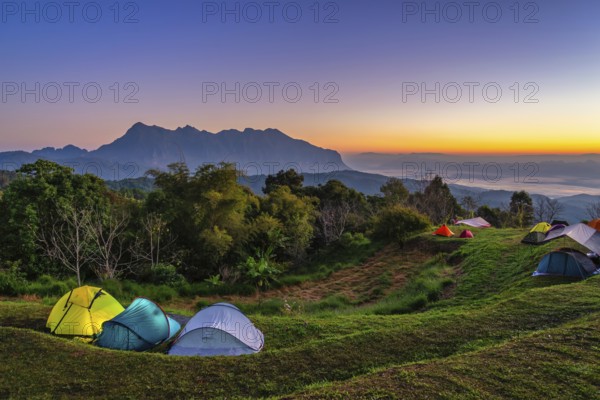Tropical forest nature landscape view with mountain range sunrise at Doi Chiang Dao, Chiang Mai Thailand