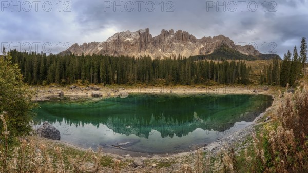 Karersee is located in the Latemarwald forest in the upper part of the Eggental valley, of the city of Bolzano at an altitude of 1520 meters above sea level of Nova Levante