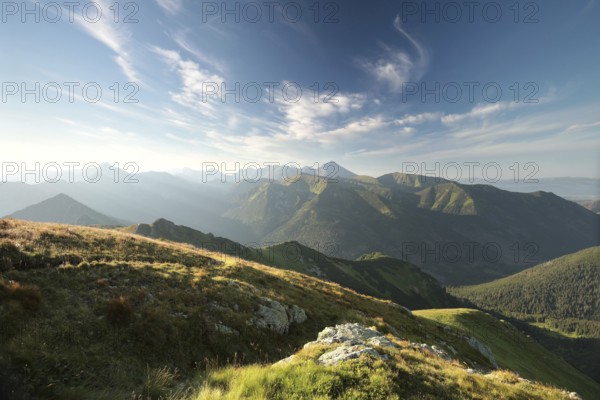 Panorama of the Tatra Mountains at sunrise. These Mountains are the highest peaks of the Carpathians on the Polish-Slovak border