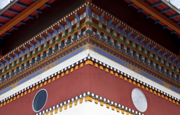 La Boulaye, TEMPLE OF THE 1000 BUDDHAS, founded in 1987 by Tibetan monks. Lamaist centre combined with a university for Tibetology, decorative forms on one corner of the building