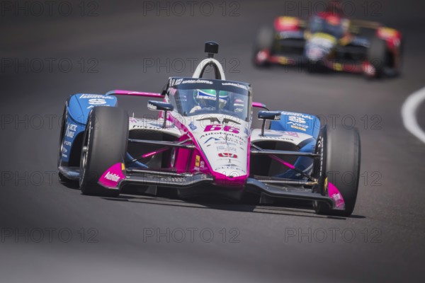 TOM BLOMQVIST (R) (66) of Cambridge, England practices for the 108th Running of the Indianapolis 500 at the Indianapolis Motor Speedway in Speedway, IN