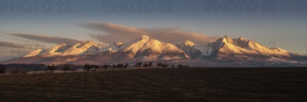 Panorama of the foothills of the High Tatras at sunrise, Slavskovsky and Lomnicky peaks