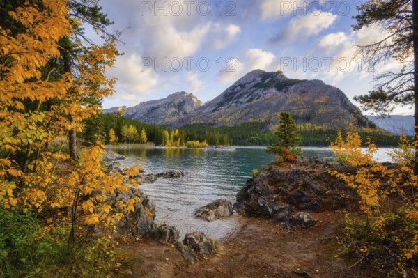 Beautiful autumn landscape scene in lake and mountain in background in west Canada