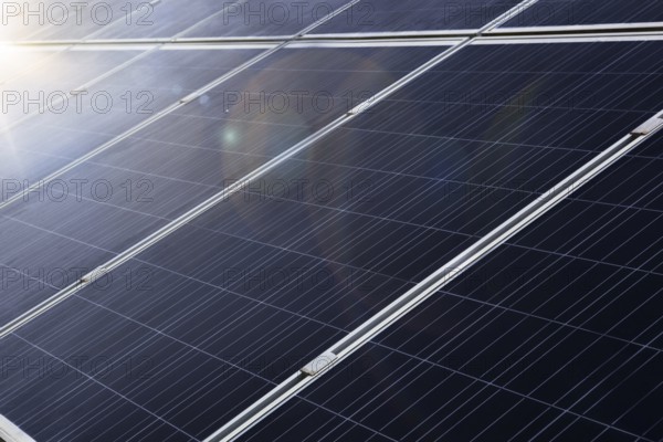 Solar power. Photovoltaic system with sun light and lens flare. Alternative energy