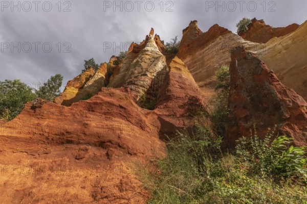 Red ocher cliff in the Luberon in Provence. Roussilon, Vaucluse, France