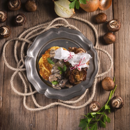 Grilled ribs with potato pancakes
