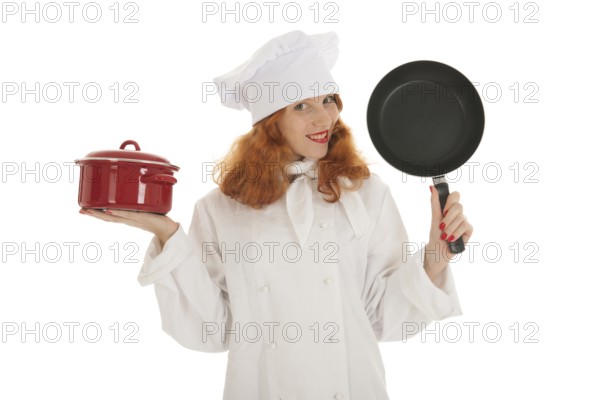 Female cook chef with red hair and pots and pans isolated over white background