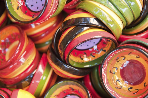 Many little bowls in different colorful patterns
