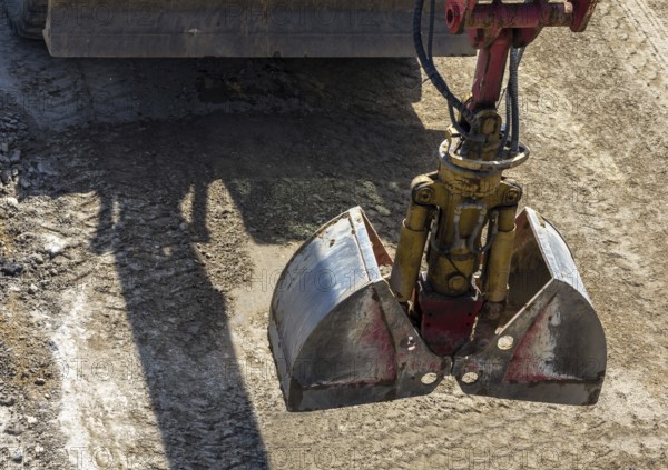 Excavator grab on the construction site