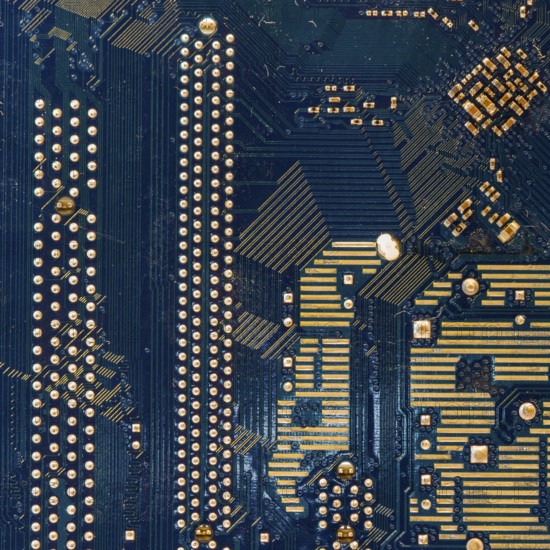 Detail of the back of a motherboard. Circuits and welds