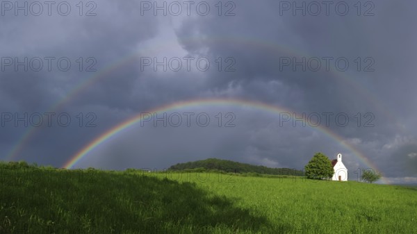 Panorama, rainbow and chapel