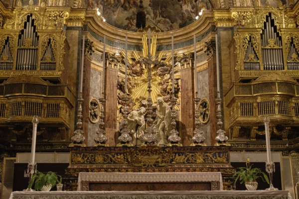 The ornate Baroque main altar and organ of St. John Co-Cathedral, Valletta, Malta