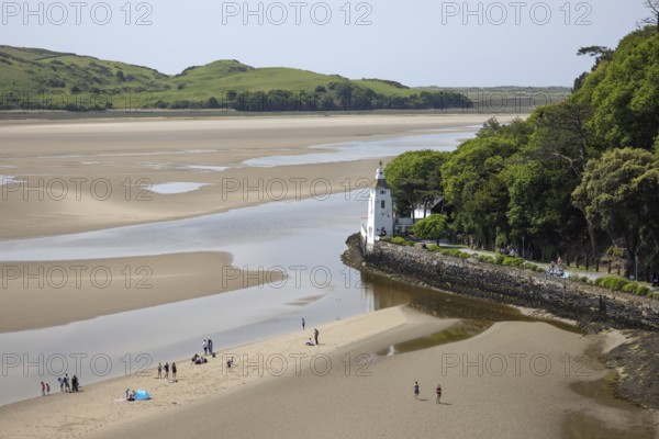 Portmeirion, Minffordd, Penrhyndeudraeth, Gwynedd, Wales, May 28 : View of architecture and the beach in Portmeirion, Wales on May 28, 2023. Unidentified people